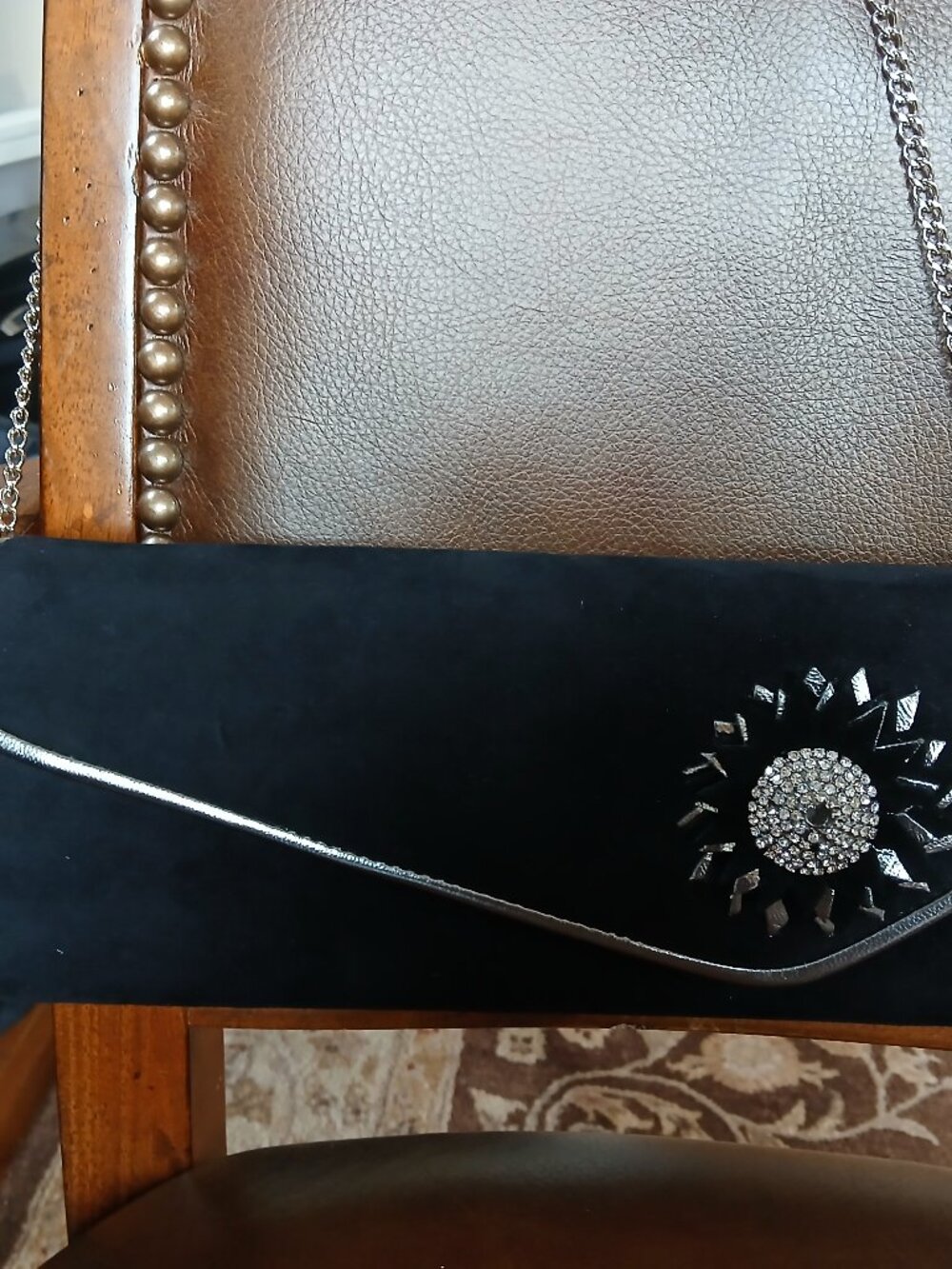 Smart womens clutch done in black brushed suede leather.